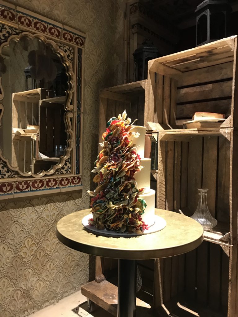 Wedding cake display idea for a Turkish bath house wedding. Cake Table and mirror.