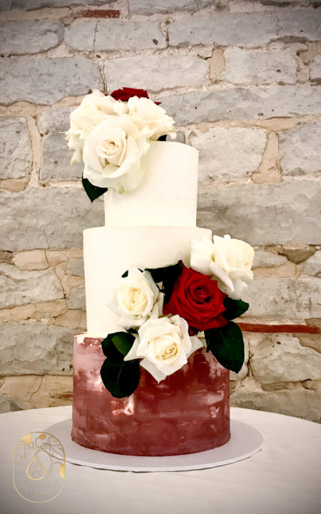 Burgundy and white rose three tier wedding cake
