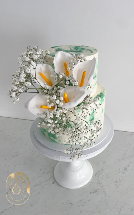 Sage Green Buttercream Painted Two Tier Wedding Cake with handmade Wafer Paper Calla Lilies