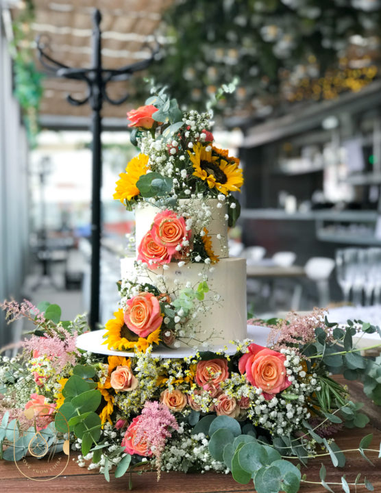 Pink Rose and Sunflower Wedding Cake