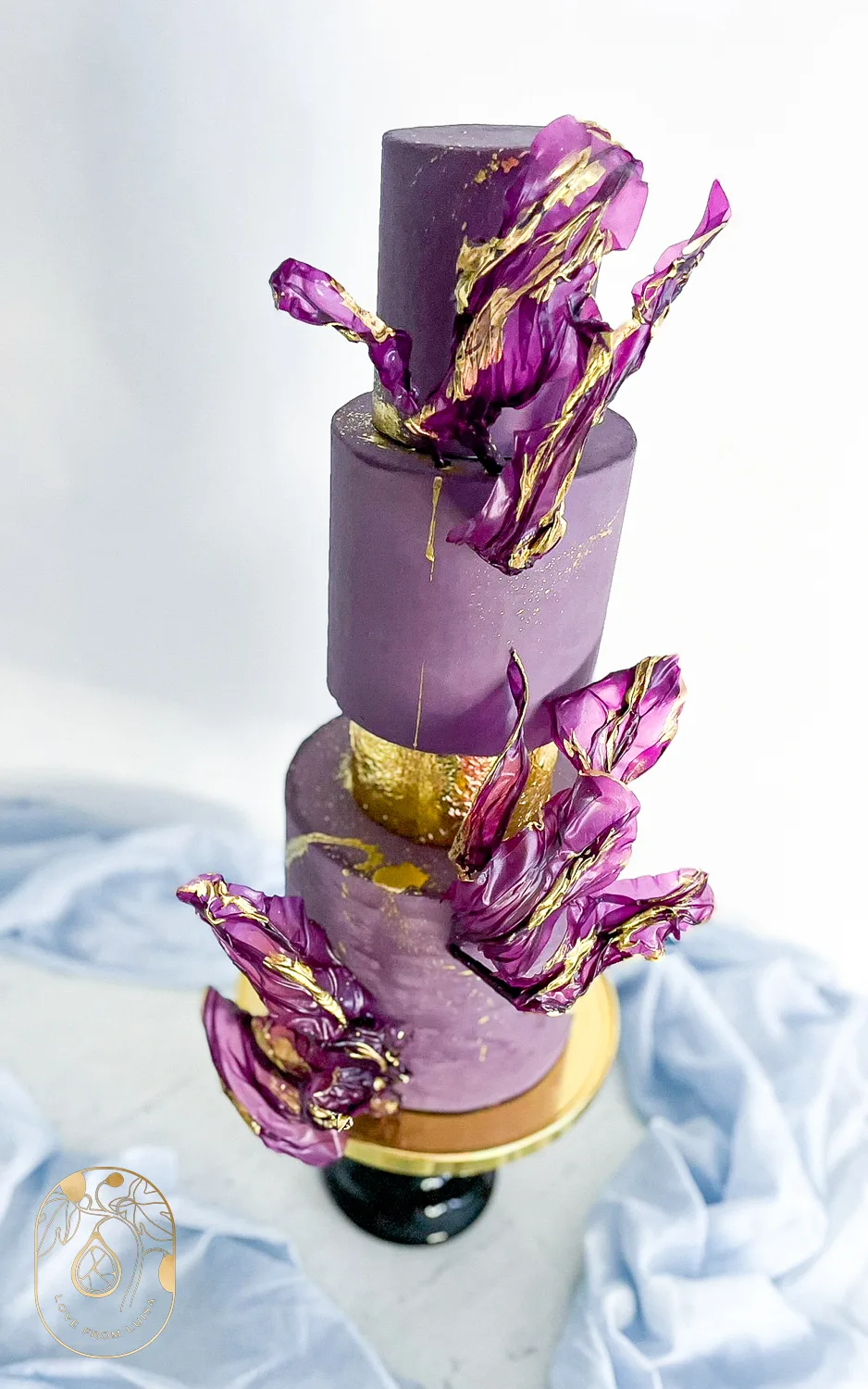 Purple and Gold Wedding Cake Shot from above with purple details and gold tier