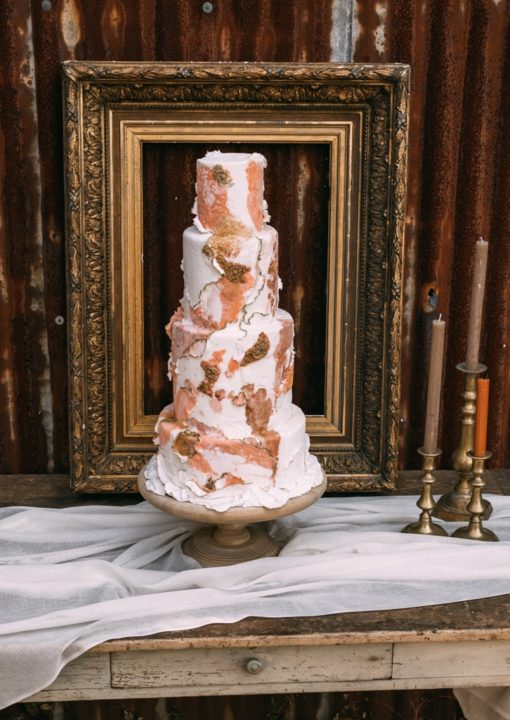Four tier fondant wedding cake taken at Wickerwood Farm by Sarah Carmody Photography