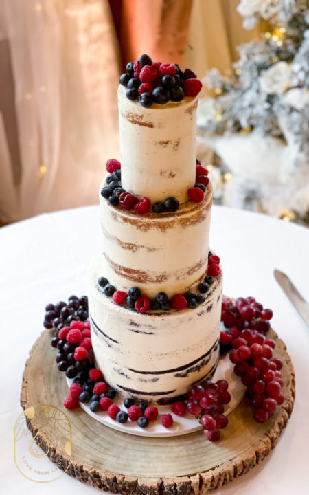 Semi-Naked Winter Wedding Cake with berries