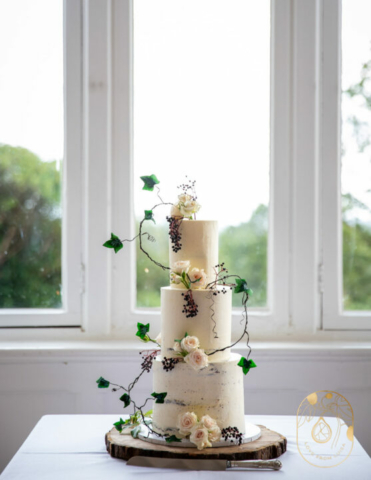 Woodland Wedding cake with three tiers set up at Highley Manor, Sussex