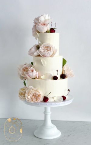 Three Tier Vegan Wedding Cake with Buttercream Flowers and Cherries