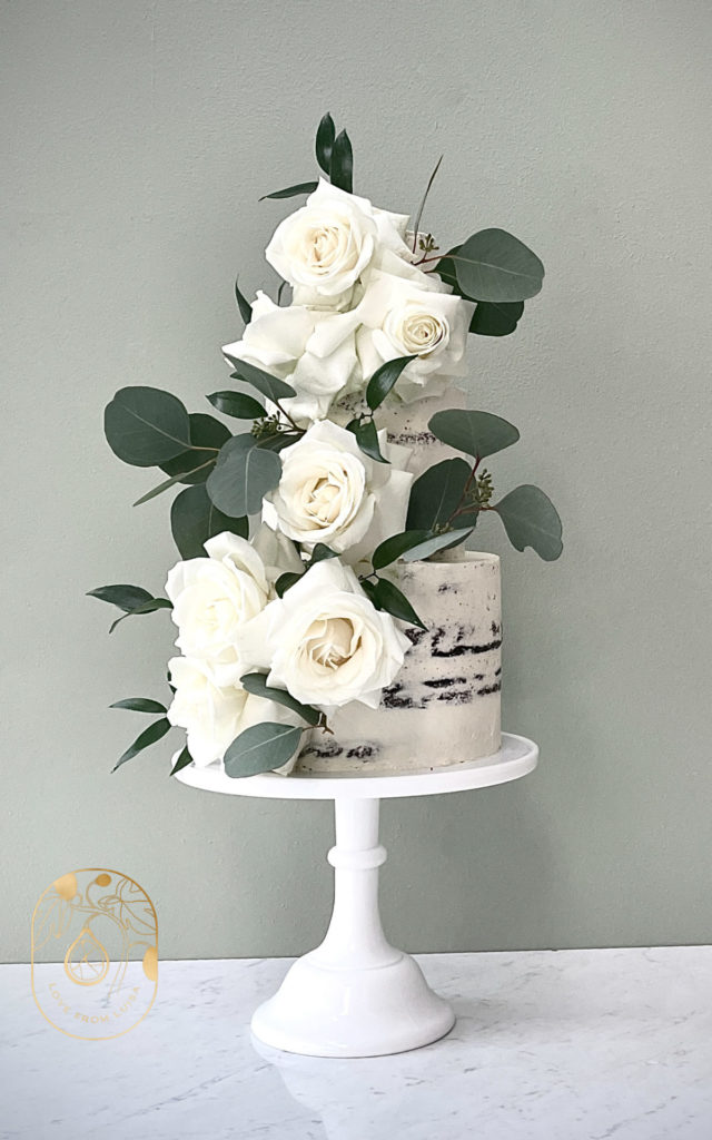 How do you work out the cost of the design? Buttercream cake with fresh flowers