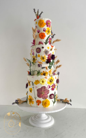 Buttercream Pressed Edible Flower Wedding Cake in a natural, organic style