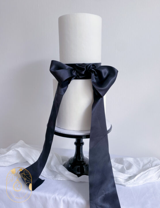 This Two tier beauty is styled for a formal black tie wedding