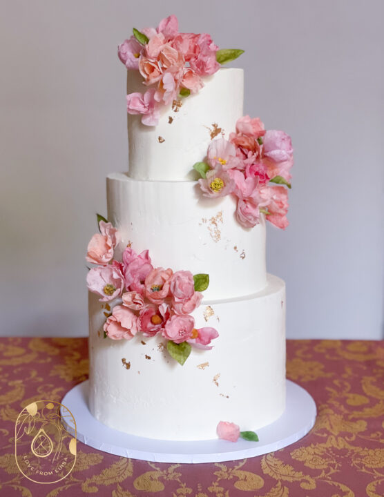 Hand made wafer paper flowers to match the bridal bouquet