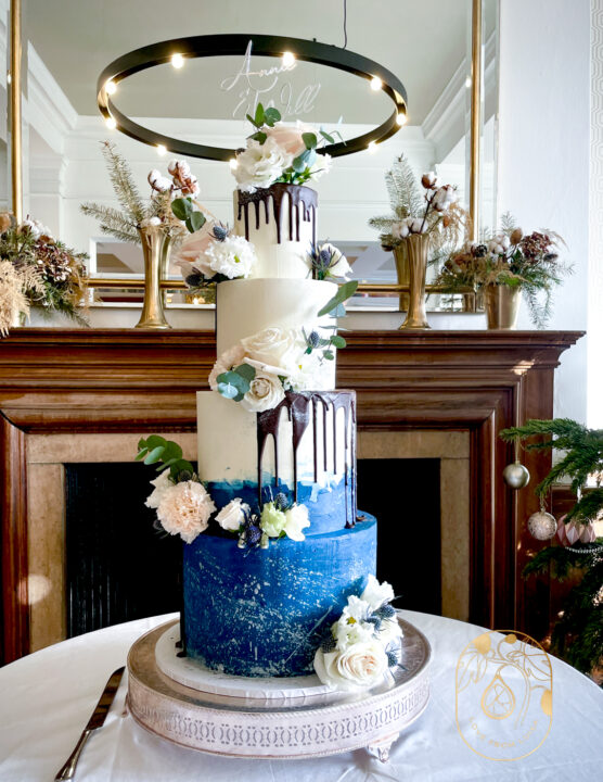 Seasonal wedding cake - Winter wedding, four tiers of cake with navy blue ombre and silver details