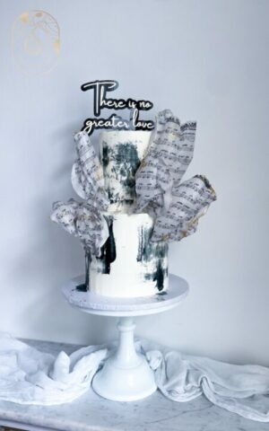 2 tier birthday cake - Sheet music birthday cake for a music lover