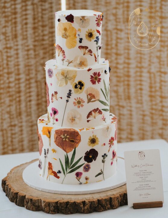 Three tier botanical wedding cake at Highley Manor wedding venue