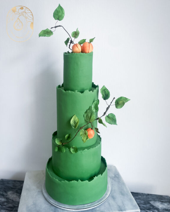 Four tier green Fondant wedding cake with wafer flowers in Botanical theme - Wedding cake inspiration/gallery 
